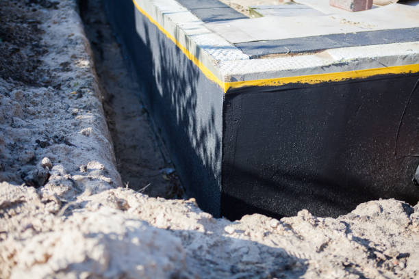 Professional Waterproofing technician working in Ada, OH